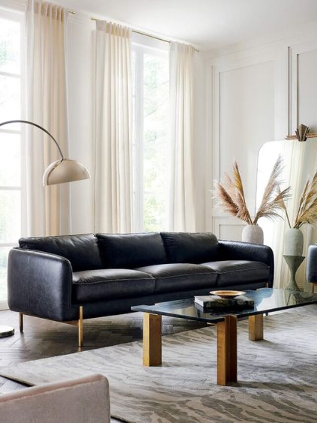 decoração com sofá preto de couro